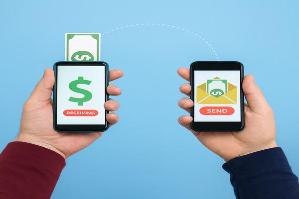 Hands making smart choices for cost-effective international money transfers