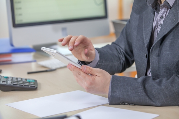 Person going to trusted branch provider for top-up services