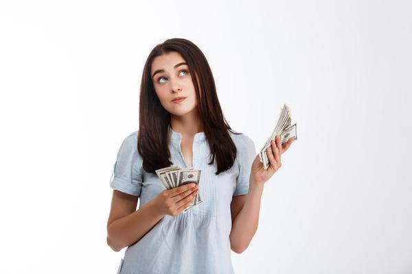Woman considering essential steps for international money transfer