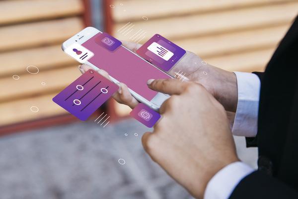 Hands Using Mobile App for Money Transfer