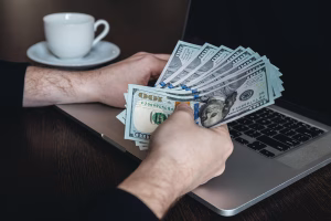 Man holding a cash from cashing a check