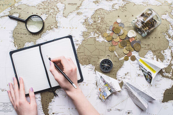 A person writing tax rules for international money transfers