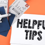 Helpful tips sign with passports and plane tickets in the table.