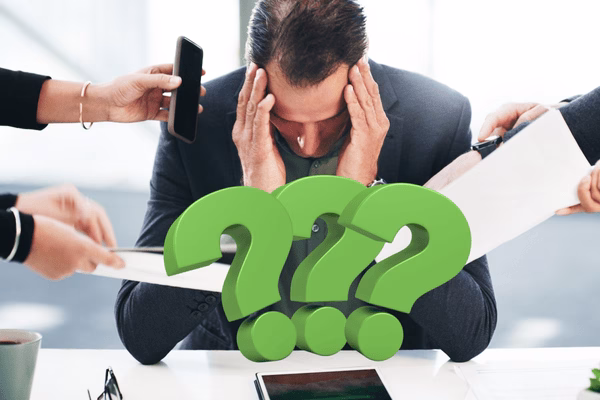 Stressed businessman surrounded by urgent work requests
