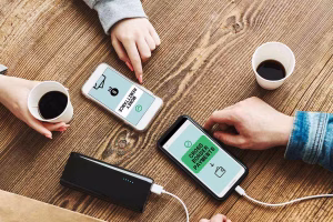 Mobile apps displaying Cross Border Payments and remittance options.