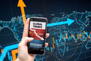 Mobile screen showing global trends impacting Cross Border Payments