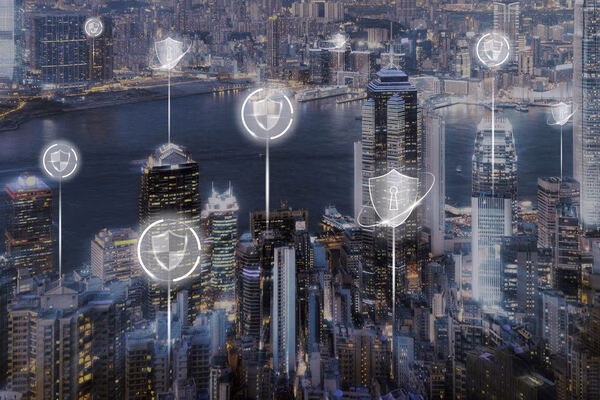 Digital security icons over smart city skyline