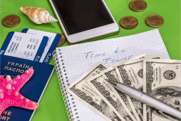 Time to travel note with passport and plane tickets
