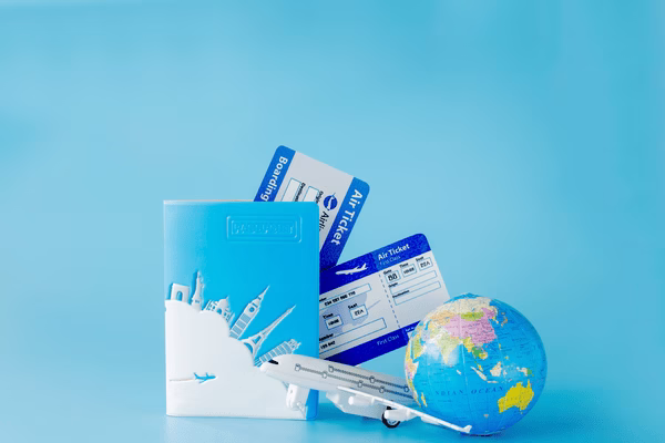 Travel Concept With Plane Tickets And Toy Jet
