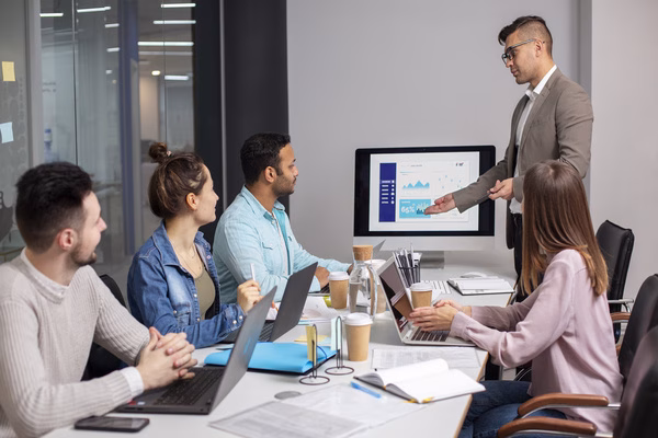 Business meeting focused on Cross Border Payments data analysis.