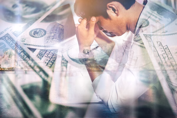 Stressed businessman facing cross-border payment challenges