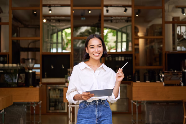 Confident entrepreneur planning Cross Border Payments for business growth.
