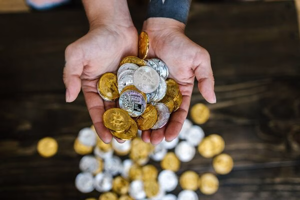 Pile of digital coins prepared for Bitcoin ATM use
