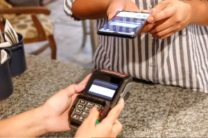 Customer completes Cross Border Payments with mobile tap.