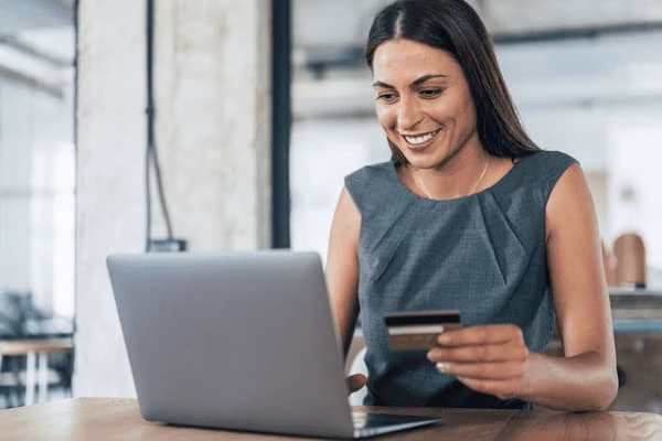 Businesswoman Managing Cross Border Payments Online
