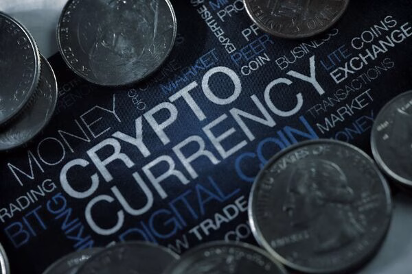 Crypto coins and Cryptocurrency text visualized for Cross Border Payments.