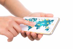 A person using a smartphone to make a cross-border payment