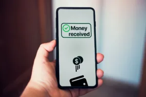 Digital wallet confirms Money Transfer completed with money received.