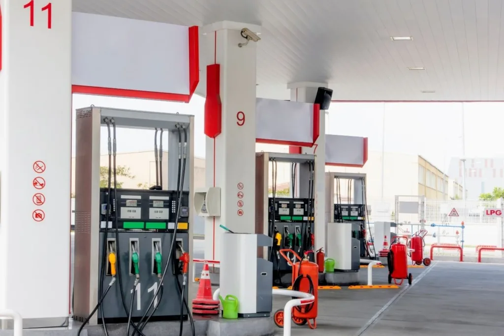 Gas station with fuel pumps where customers can Cash Checks.