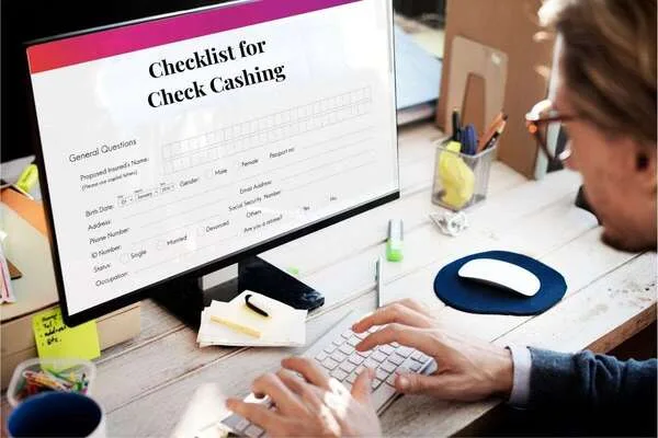  Man reviewing checklist for making the most of personal checks
