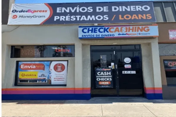 OrderExpress store sign displays services including money transfer and cash a check.
