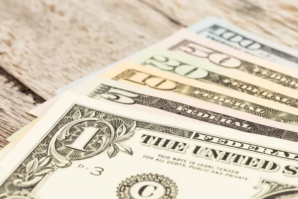 US dollar bills arranged for money order payment