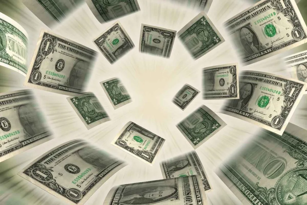 Billetes de dólar flotantes que representan servicios modernos de cambio de cheques