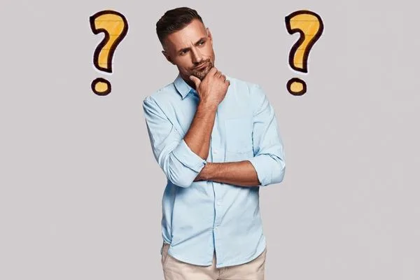 Person thinking carefully about the right money transfer option