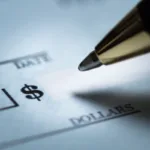 Bolígrafo para cobrar cheques y llenar el monto en dólares del cheque