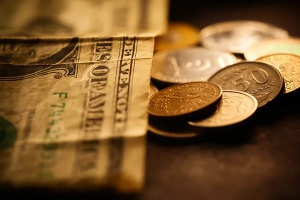 Cash And Coins Used For Money Order Payment
