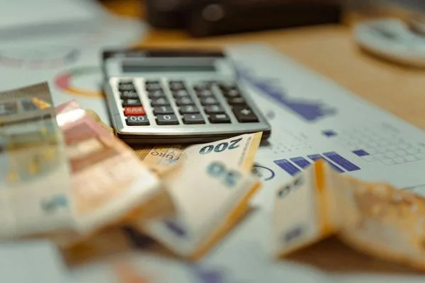 Financial charts with cash and check cashing process
