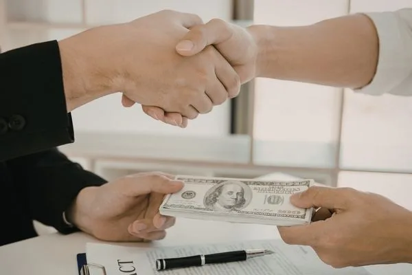 Agreement Reached During In Person Currency Exchange Transaction