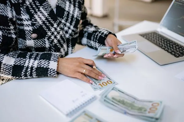 Money Transfer Cash Counting At Office Desk