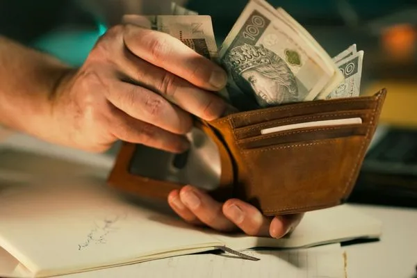 Currency Exchange Foreign Banknotes Placed Inside Leather Wallet