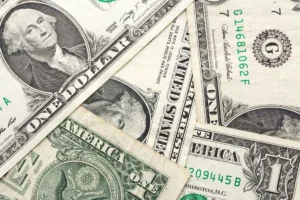 Cambio de divisas Billetes de un dólar estadounidense Patrón superpuesto