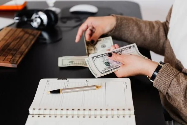 Counting cash before completing a check cashing transaction